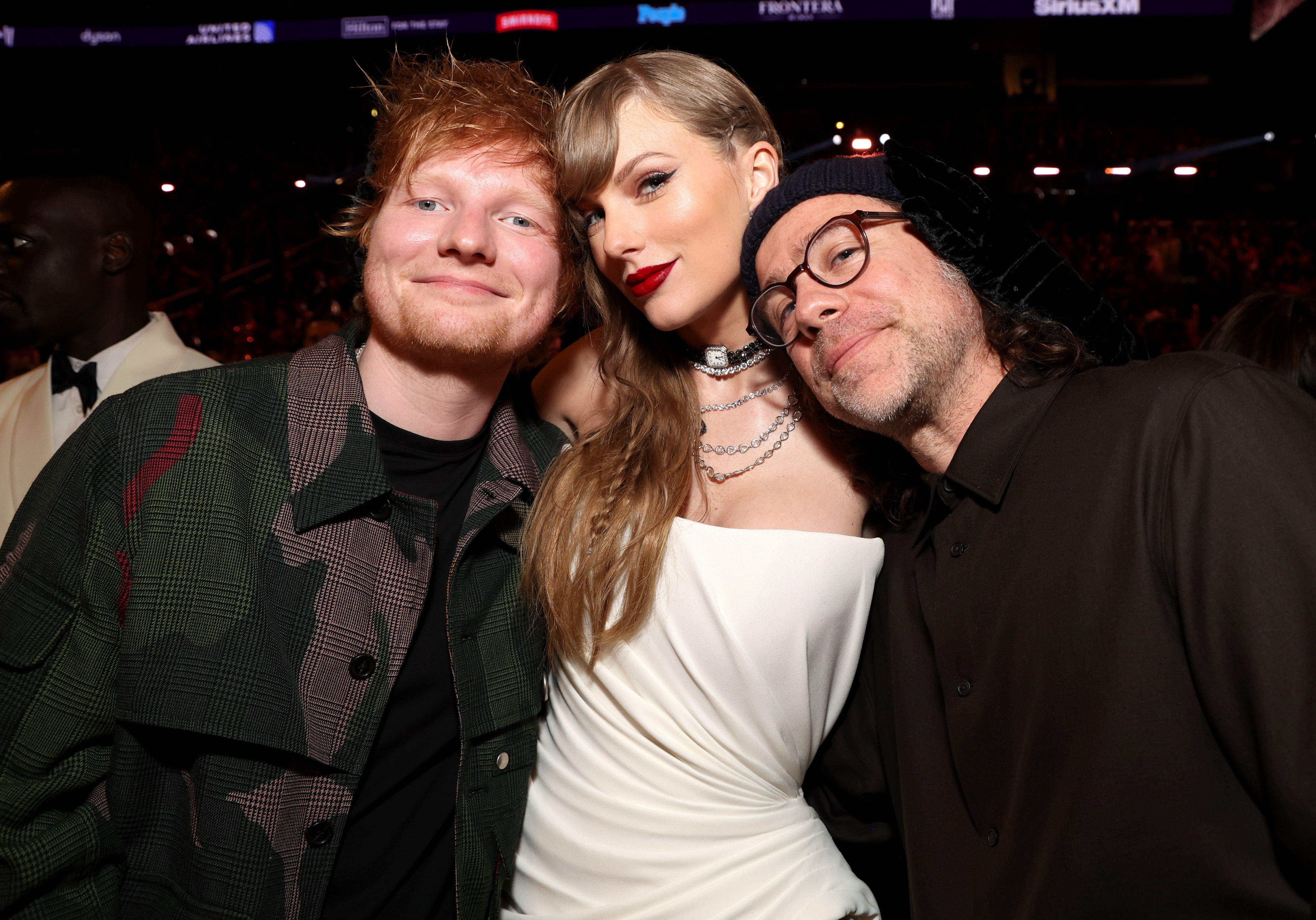 Nice reunion of Taylor Swift and Ed Sheeran who, in addition to their taste in cats, share a past of friendship that makes it so nice to see them together again.  And in between, the founder of The National.