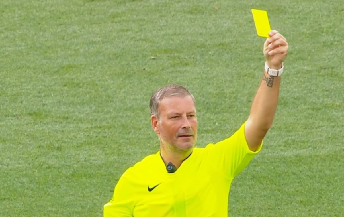 A Soccer Player Receives A Yellow Card A Soccer Player Receives A Yellow Card