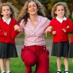 A photographer captures a mother and her quadruplets